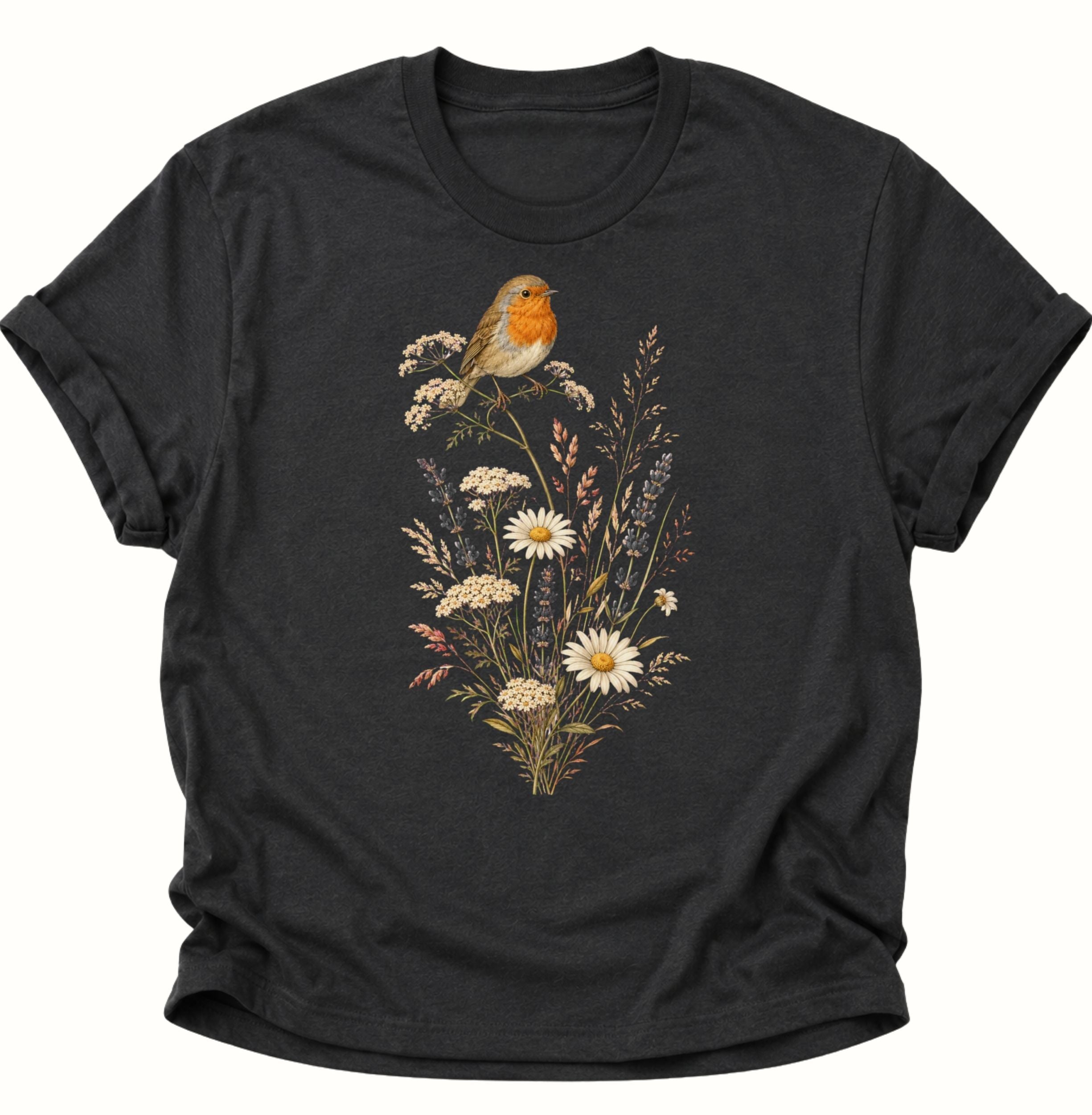 Schwarzes Unisex T-Shirt mit Rotkehlchen, Gänseblümchen und feinen Wildblumen von Pine & River.
